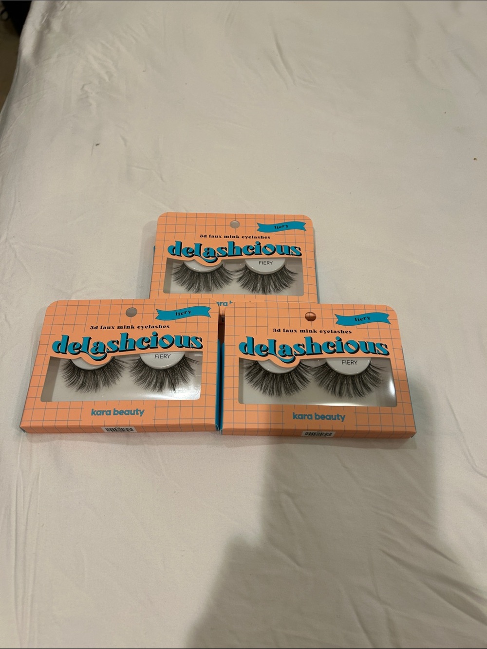 Three of Delashcious Fiery Faux Mink Lashes by Kara Beauty - Orange